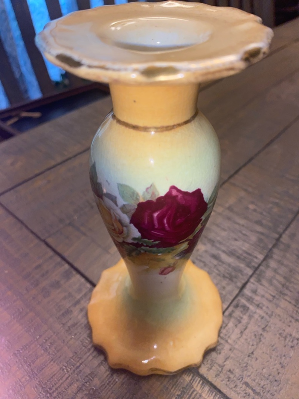 6.5” tall antique tapered candle holder